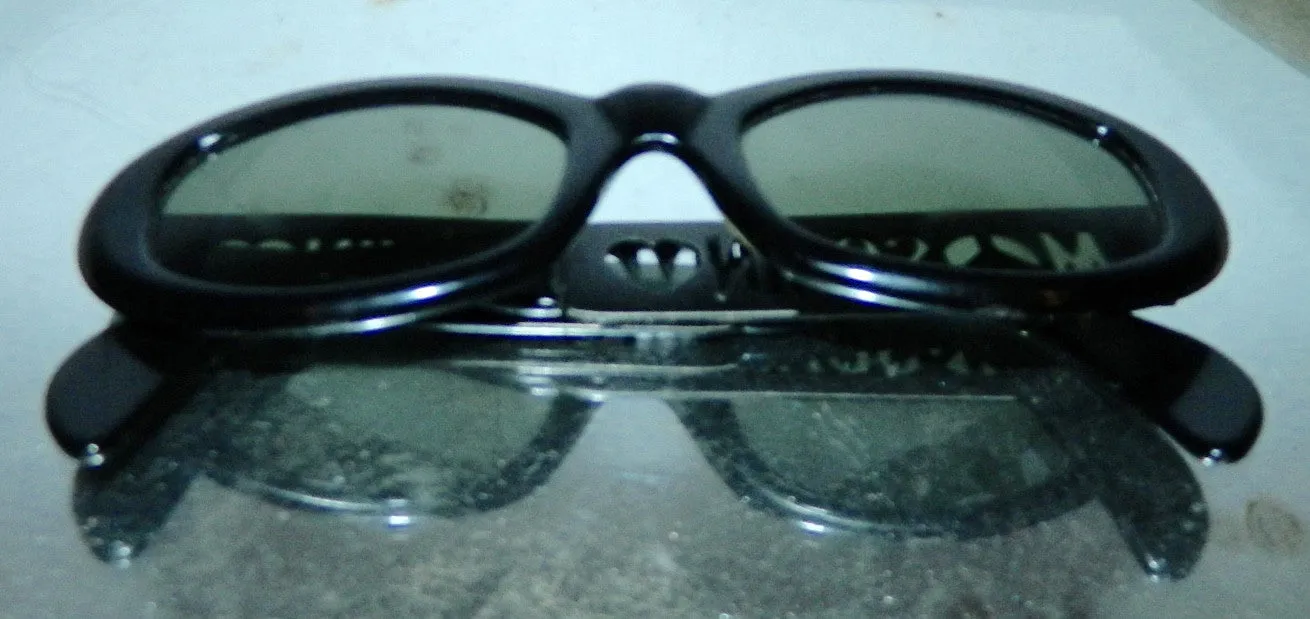 vintage 1990s MOSCHINO sunglasses cut out logo glasses frames black plastic